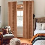 Terracotta-colored tufted mesh textured curtains