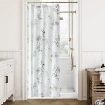 White curtains with blue floral pattern